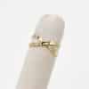 Bague en forme de X en acier inoxydable doré