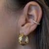 Bague d’oreille – Earcuff plaqué or avec petits strass incrustés Notre site internet La Boutique de Cha dispose d’une centaine de petites bagues: n’hésitez pas à porter ce bijou en accumulation