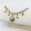 collier composé d’une chaine rétro vintage torsadée et travaillée ainsi que de jolis pendentifs en forme de lune, de soleil – Bijou lune, petite étoile et petit coeur 