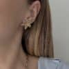 Puces d’oreilles en acier inoxydable or en forme de fleurs