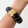Bracelet torsadé de type jonc, manchette, en acier inoxydable et acétate de couleur Noire