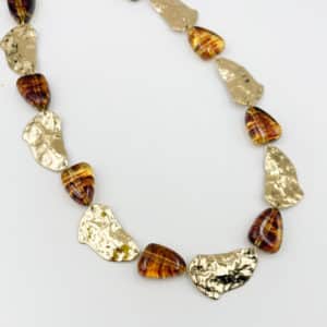 Collier en acier inoxydable et perles d'acétate couleur ambre