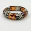 Bracelet monté sur élastique avec perles en acétate de couleur ambre et imprimé léopard