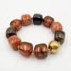 Bracelet monté sur élastique avec perles en acétate de couleur