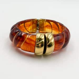Bracelet torsadé de type jonc, manchette, en acier inoxydable et acétate de couleur ambre
