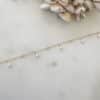 Collier en acier inoxydable doré avec pendentifs perles d’eau douce