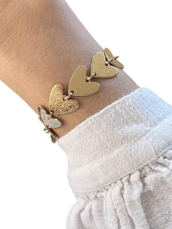 Bracelet à maillons XXL en acier inoxydable de couleur or et en forme de petits coeur griffés