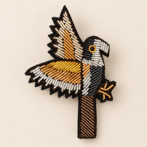 Broche artisanale perroquet
